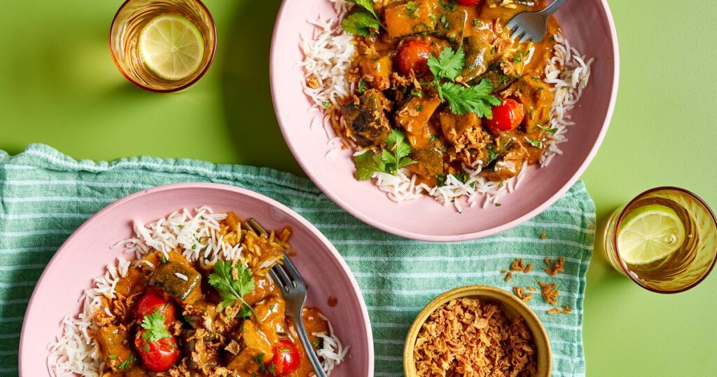 Aubergine & tomato satay curry with crispy onions Aubergine & tomato satay curry with crispy onions