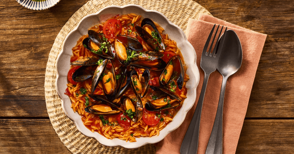 One-pan cherry tomato & mussel orzo with garlic butter