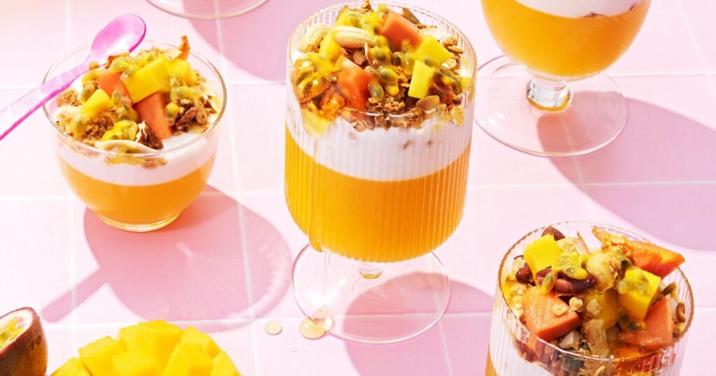 Tropical breakfast trifles with coconut granola